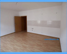 Wohnzimmer mit Küche - Schicke 2 – Raumwohnung mit Balkon in Köthen